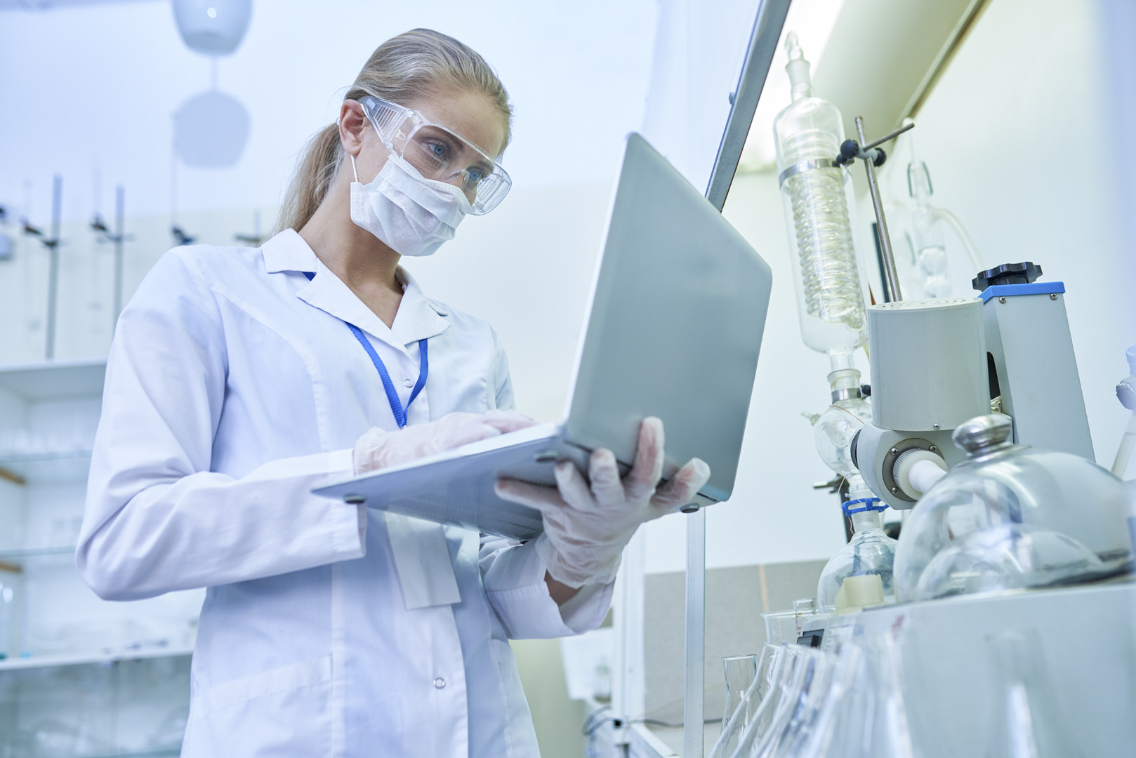 Scientist reading article in laboratory